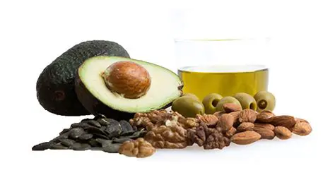 Grasas saludables como aceite de oliva y nueces